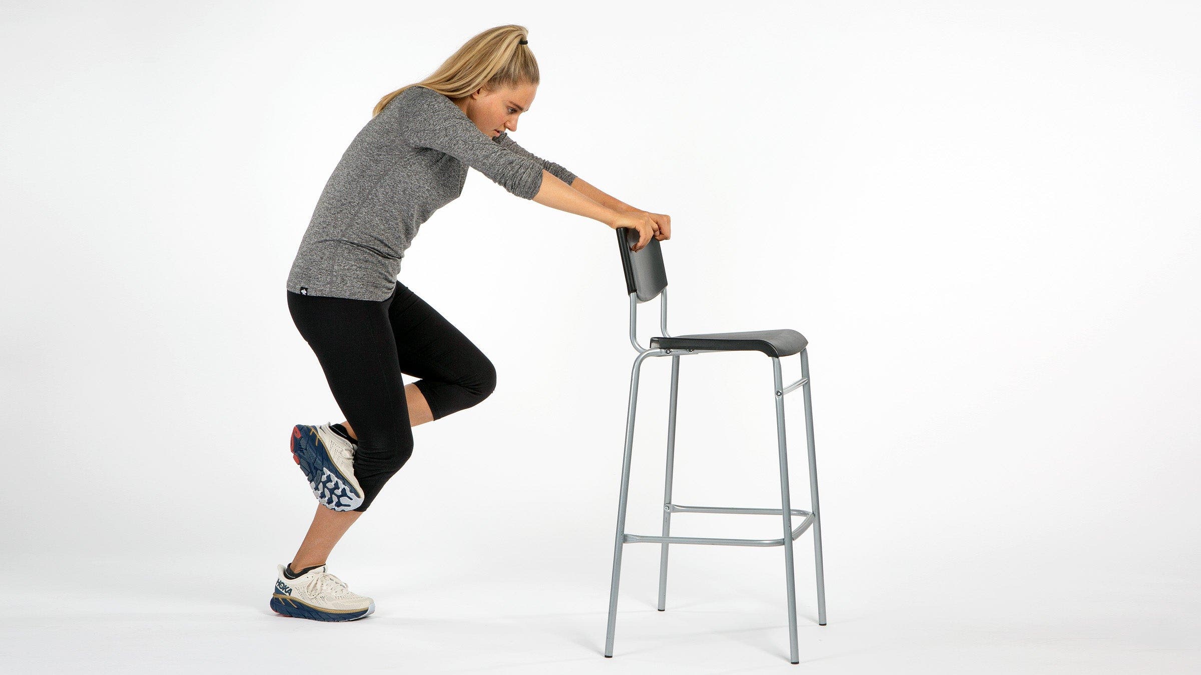 runner doing the Bent-Knee Calf Stretch