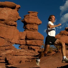 Man running in Utah while using a beginner 50K training plan to train.