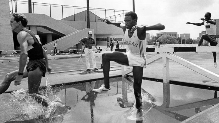 Sang competes in a steeplechase race against others in a black and white photo