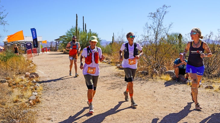 Courtney Dauwalter runs with her mom at the 2023 Javelina Jundred