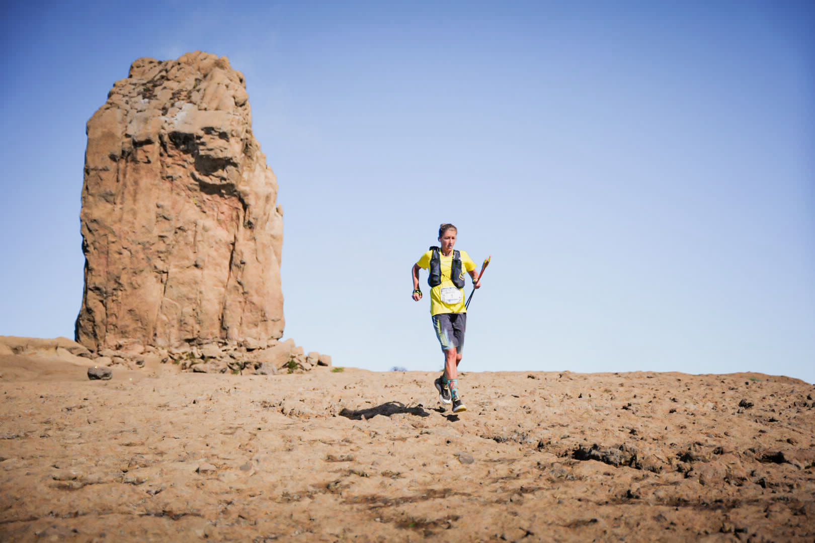 Courtney Dauwalter runs cross a barren stretch at Transgrancanaria