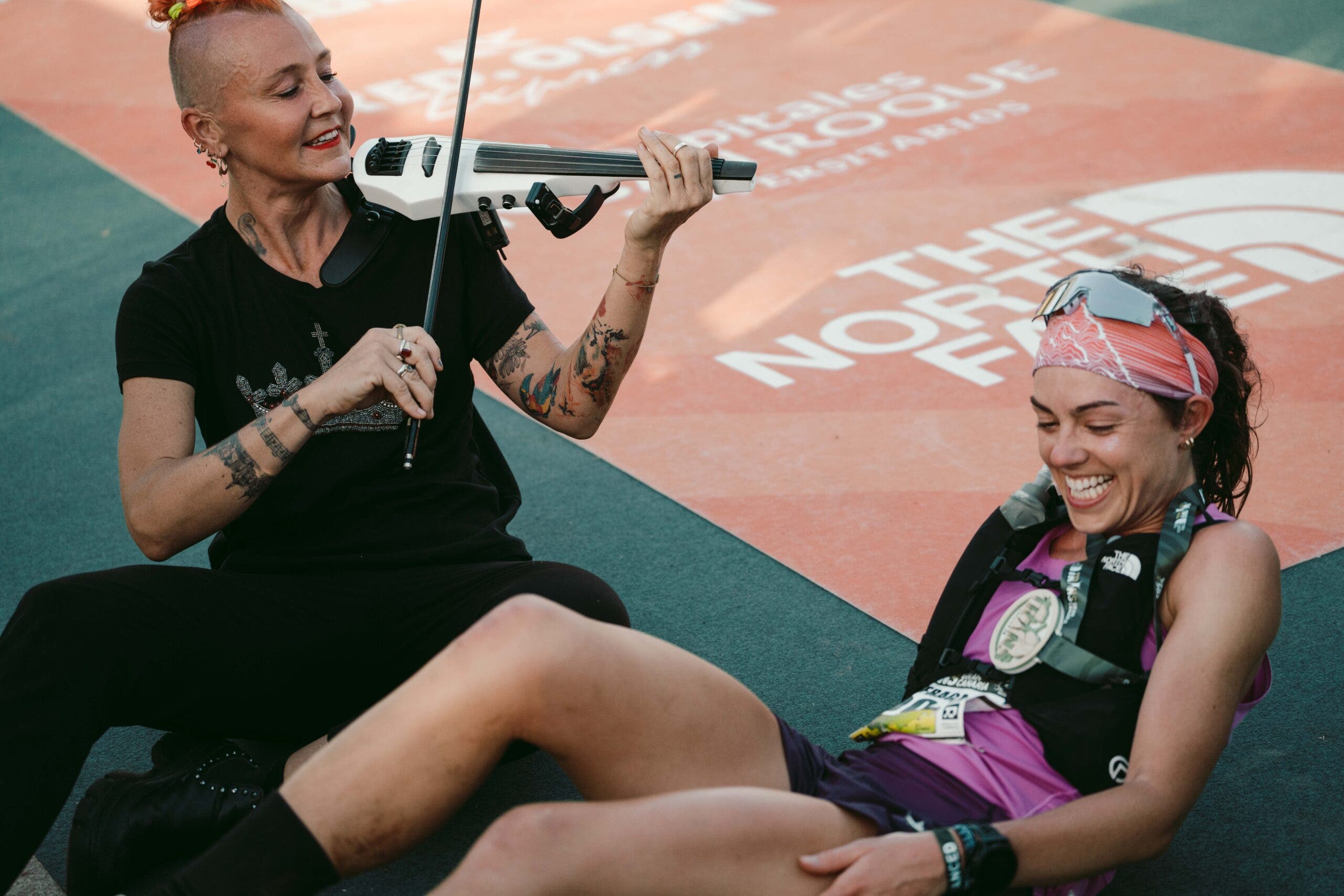 Tara Fraga is serenaded at the finish line of Transgrancanaria