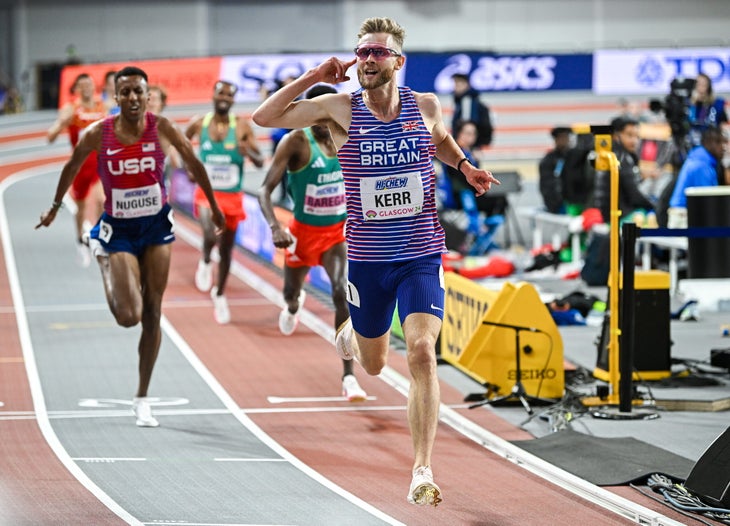 Josh Kerr celebrates while crossing the line for the win at the World Athletics Indoor Championships.