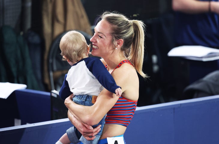 Elle St. Pierre holds her son Ivan at the World Athletics Indoor Championship