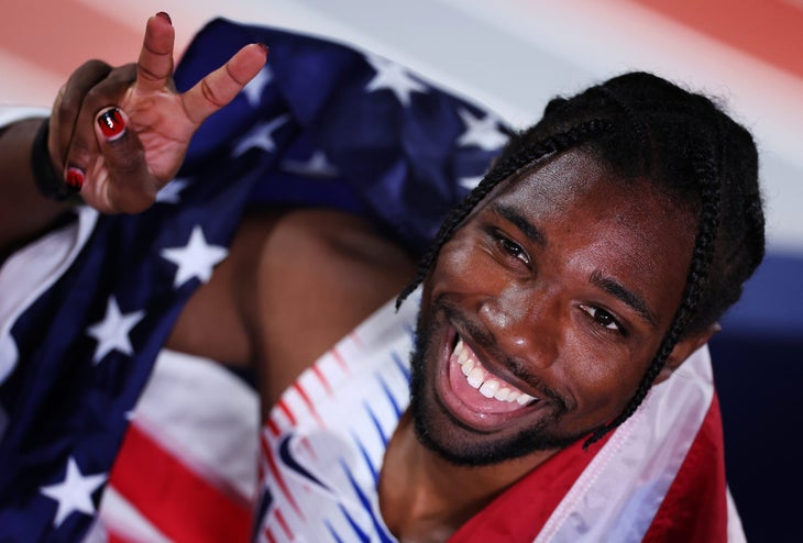 Noah Lyles smiles for the camera after winning a medal at the World Athletics Indoor Championships