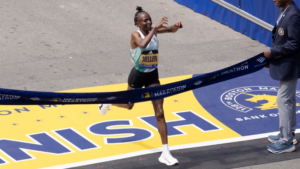 Hellen Obiri at the finish line of the 2024 Boston Marathon