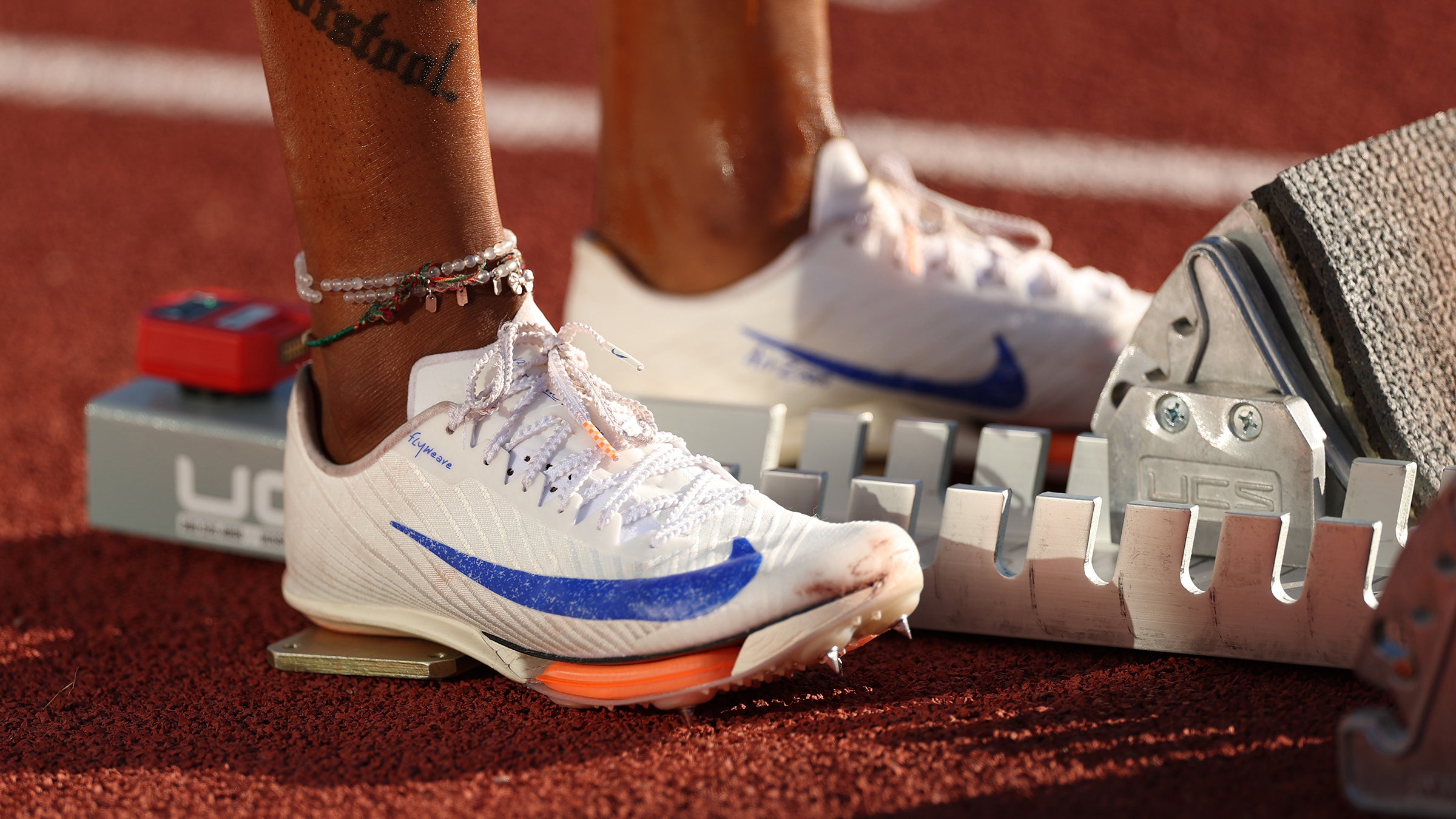 Here are the Orange Track Spikes of the Paris Olympics