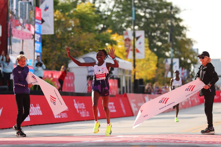 Ruth Chepngetich of Kenya crosses the finish line to win the 2024 Chicago Marathon and sets a new world record with a time of 2:09:56 at Grant Park on October 13, 2024 in Chicago, Illinois.