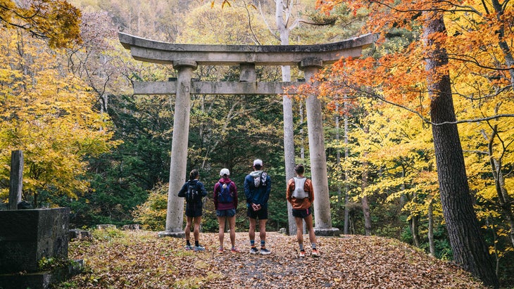 a group of runners in nature in Japan