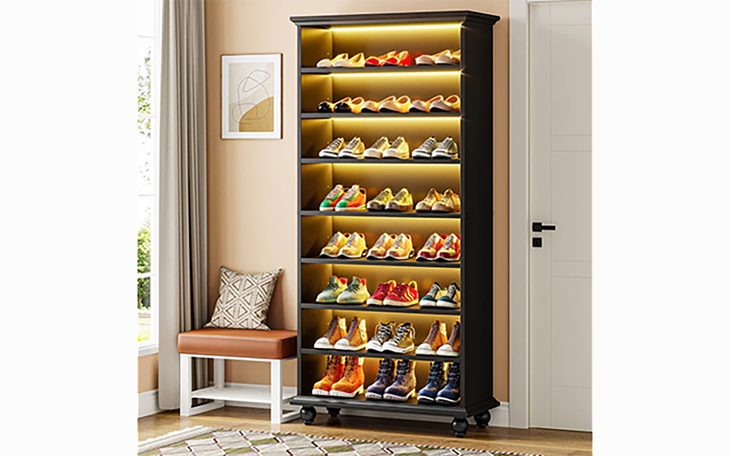 A cabinet with shoes that lights up