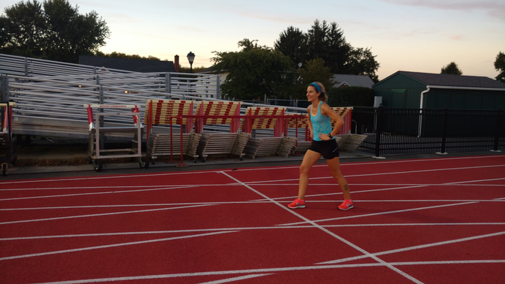 Woman stands on the track