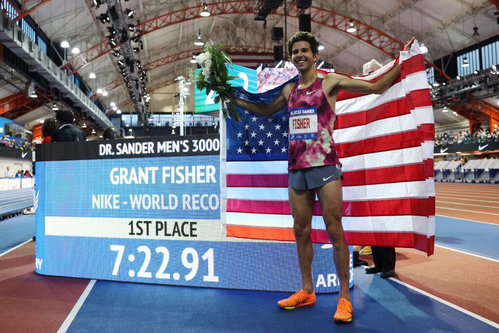 Grant Fisher posing after setting a new indoor 3,000-meter world record during the 117th Millrose Games at The Armory Track.