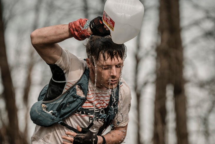 John Kelly cools off with some water at the 2025 Barkley Marathons