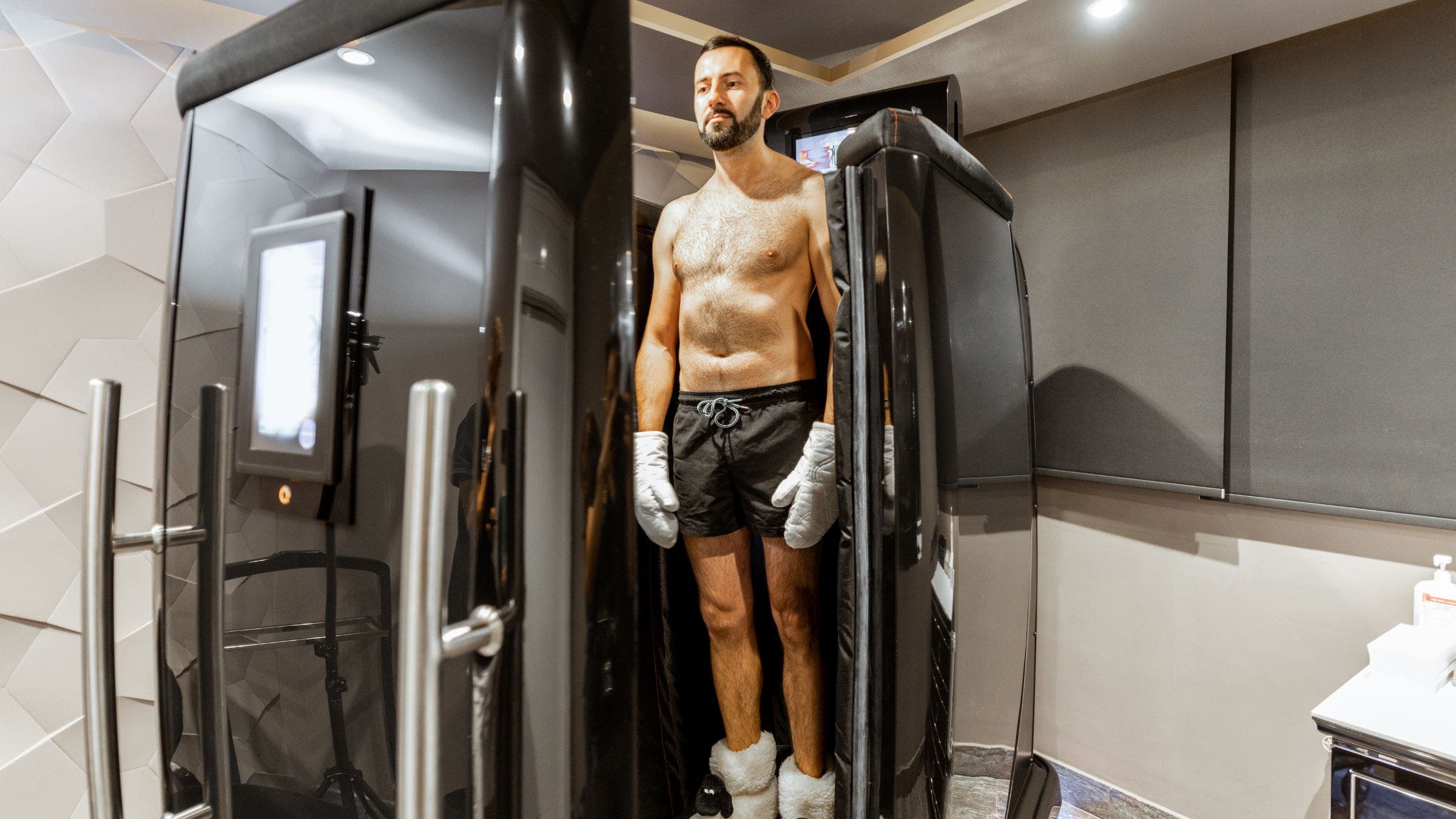 a man inside a cryo therapy chamber