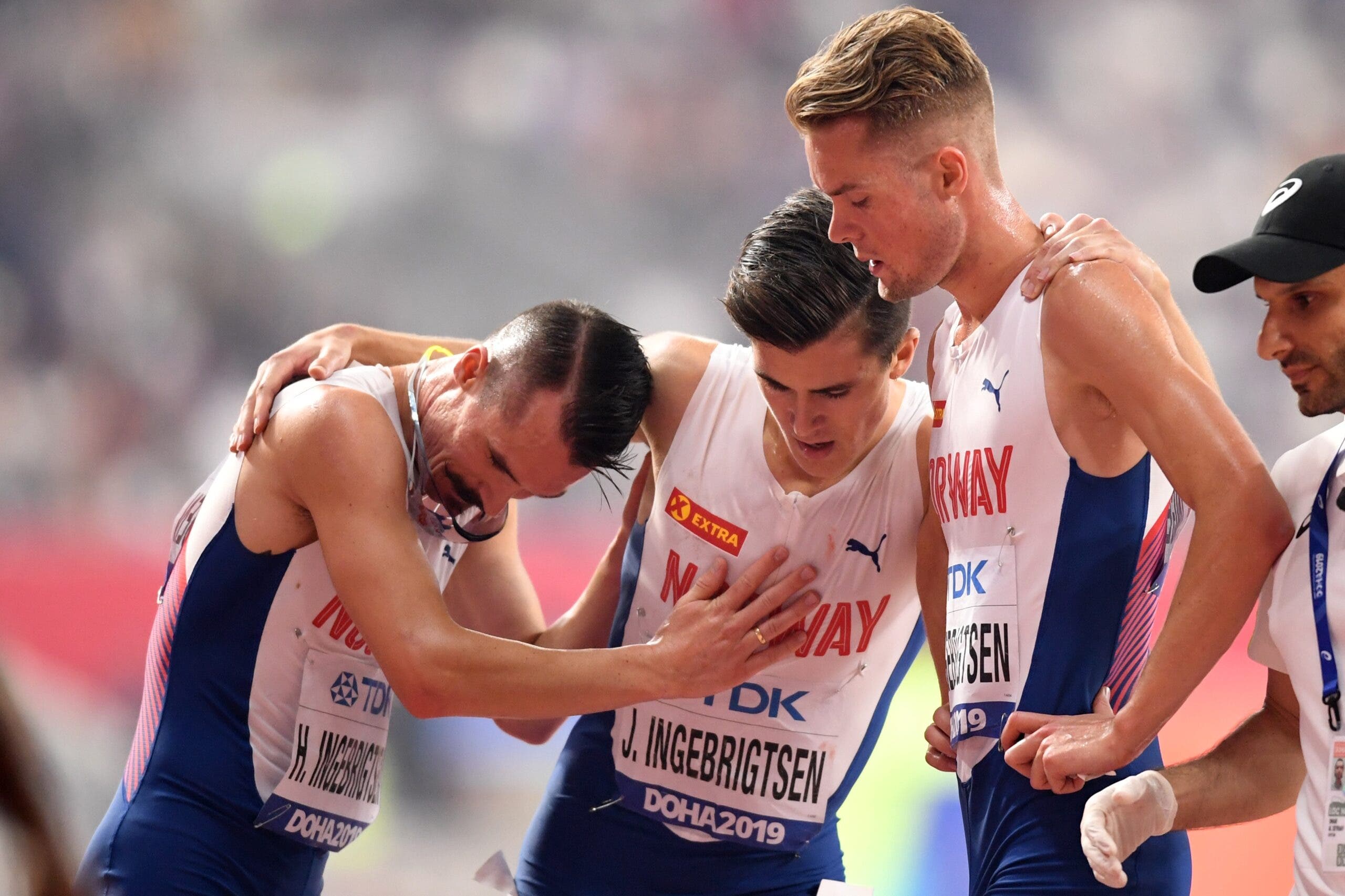 (From L) Norway's Henrik Ingebrigtsen, Norway's Jakob Ingebrigtsen and Norway's Filip Ingebrigtsen compete in the Men's 5000m final at the 2019 IAAF Athletics World Championships at the Khalifa International Stadium in Doha on September 30, 2019. The Ingebrigtsen for their father Gjert has just ended.