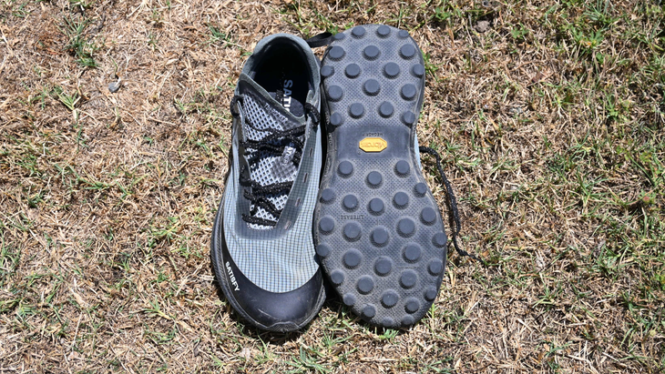 a photo of the satisfy the rockert shoe with the round treads showing on the underfoot