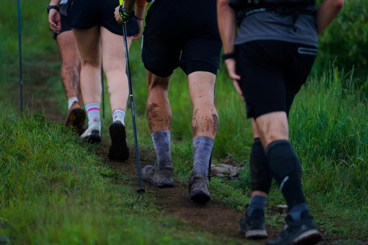Quebec Mega Trail participants muddy their calfs.