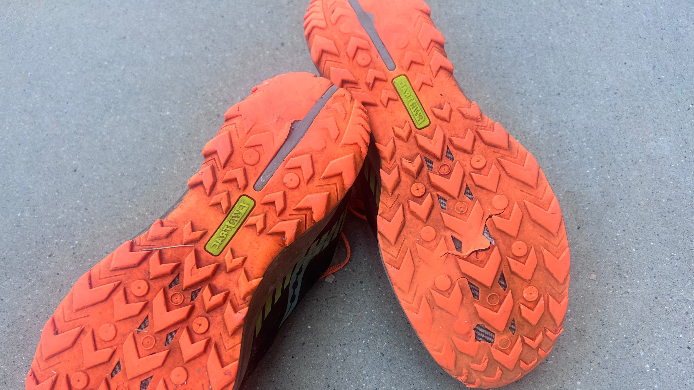 shoes with smoothed outsoles, showing running shoes' wear pattern