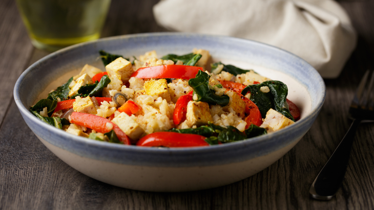bowl of rice, tofu, and roasted veggies as part of marathon training meal plan