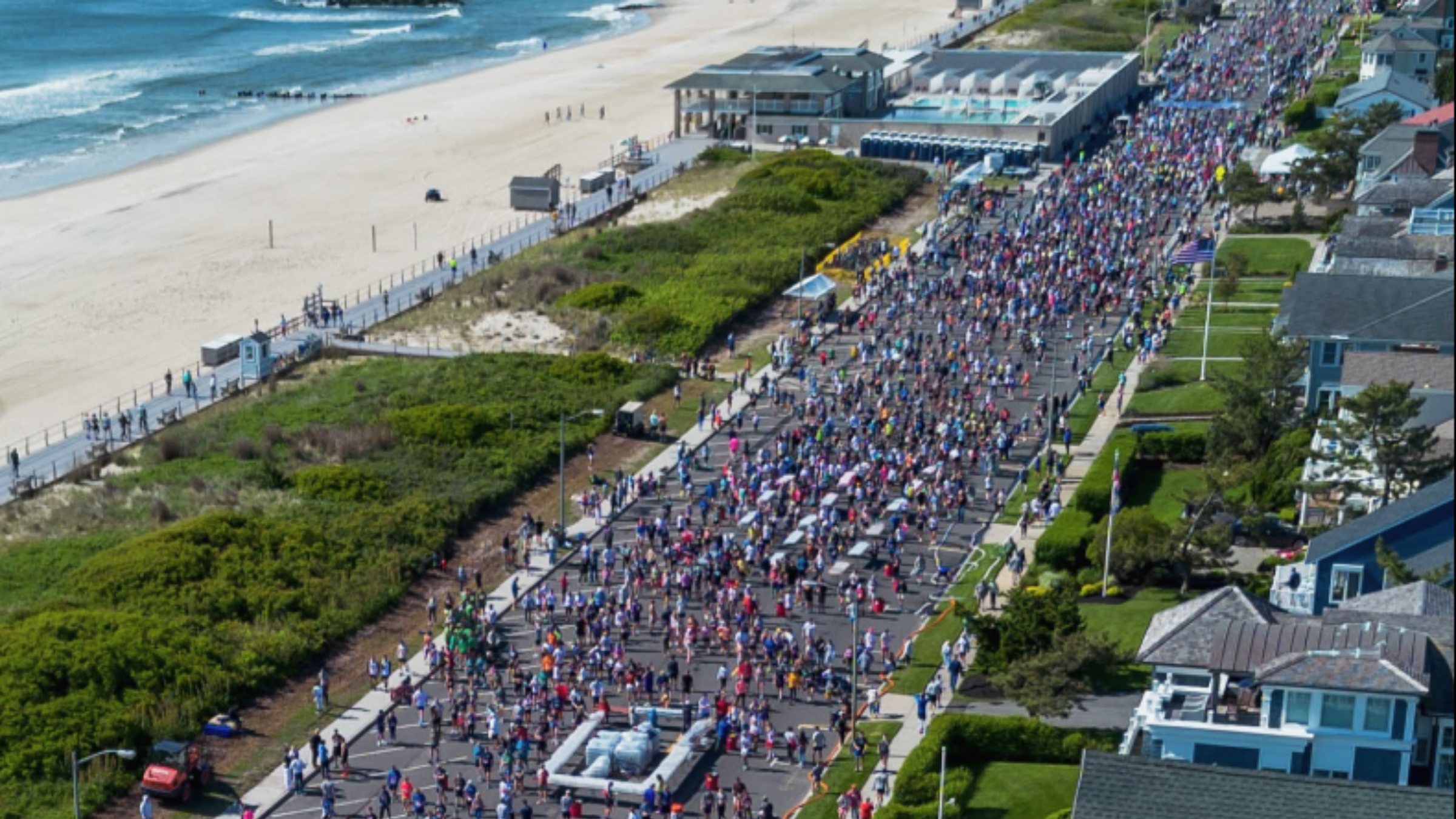 an overview shot of runners on ocean avenue in spring lake, NJ 