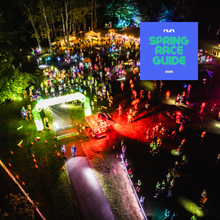 an overhead view of the moonlight falls marathon with neon lights and a large crowd