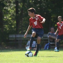 Grant Fisher playing youth soccer.