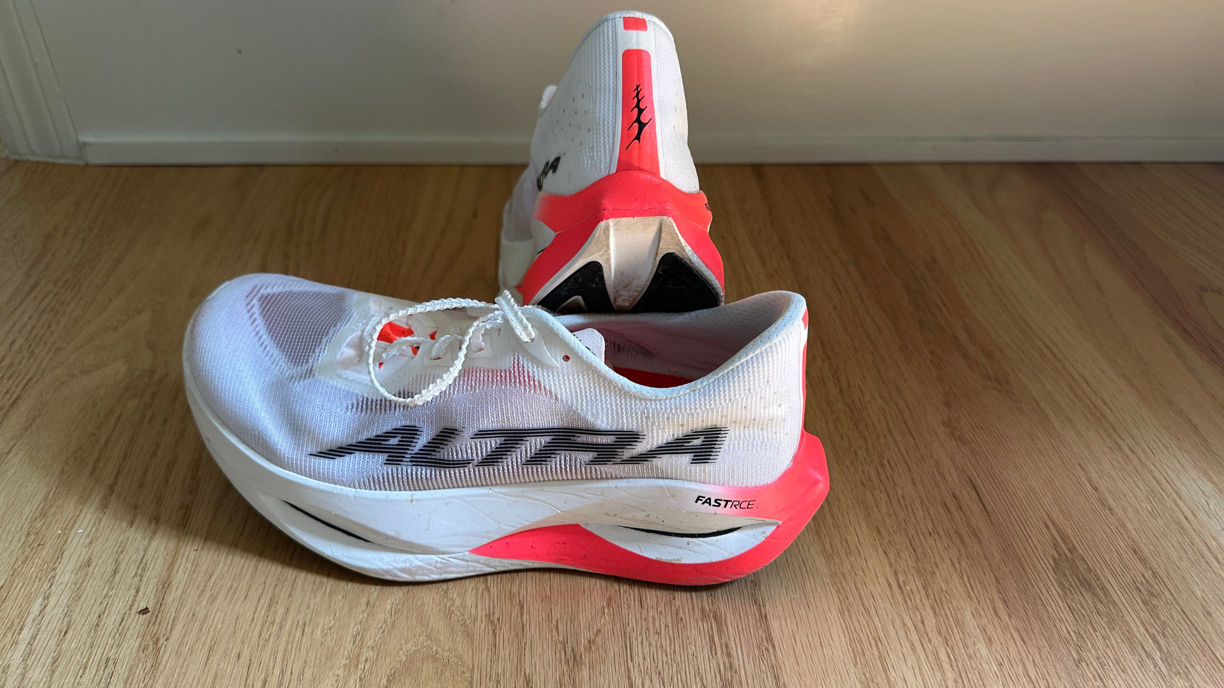 white and red altra vanish carbon 3 shoes
