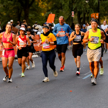 a group of runners at the NYCM