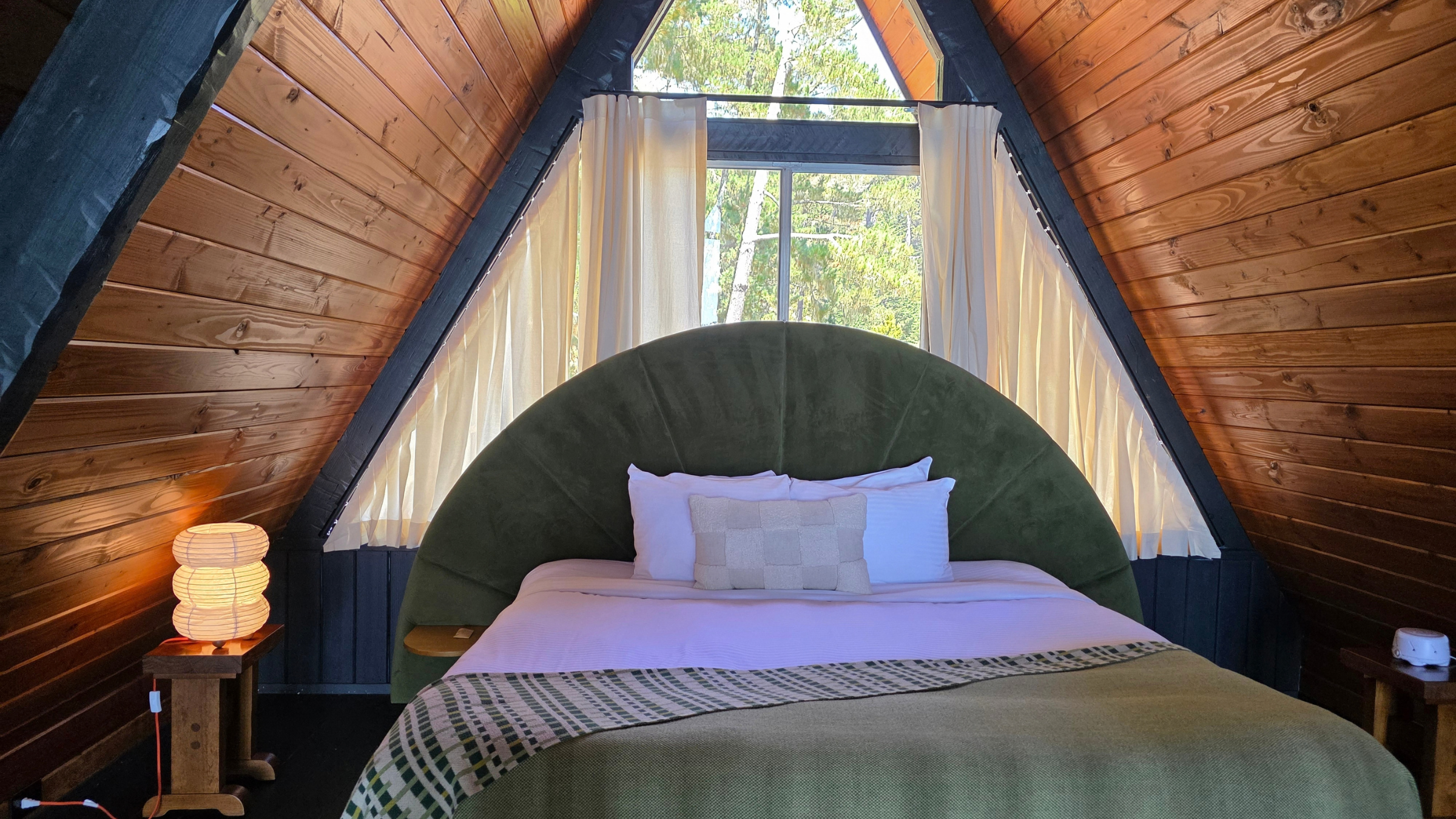 the big bed inside the Aframe