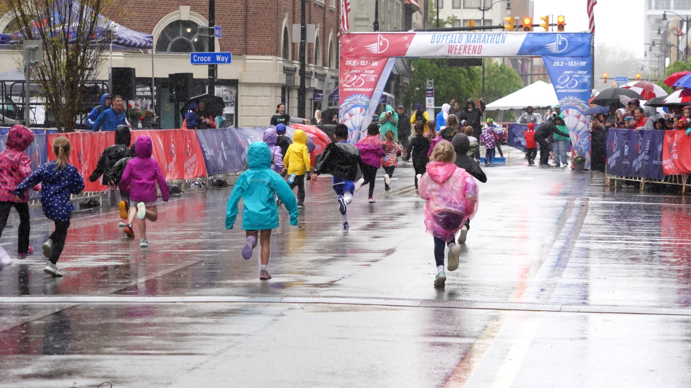 kids running race in rain