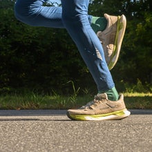 Running shoes from new brand January on testers feet mid-run